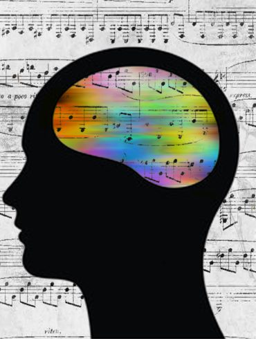 A shadow of a head with colorful music notes in the brain.