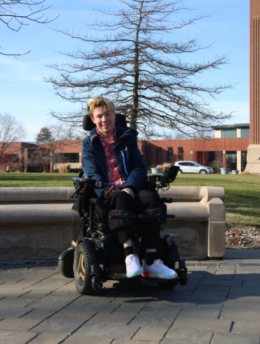 Freshman journalism major Dillon Rosenlieb poses for a photo Dec. 7, 2023 by the University Green. Rosenlieb in one of four siblings in his home. Mya Cataline, Ball Bearings